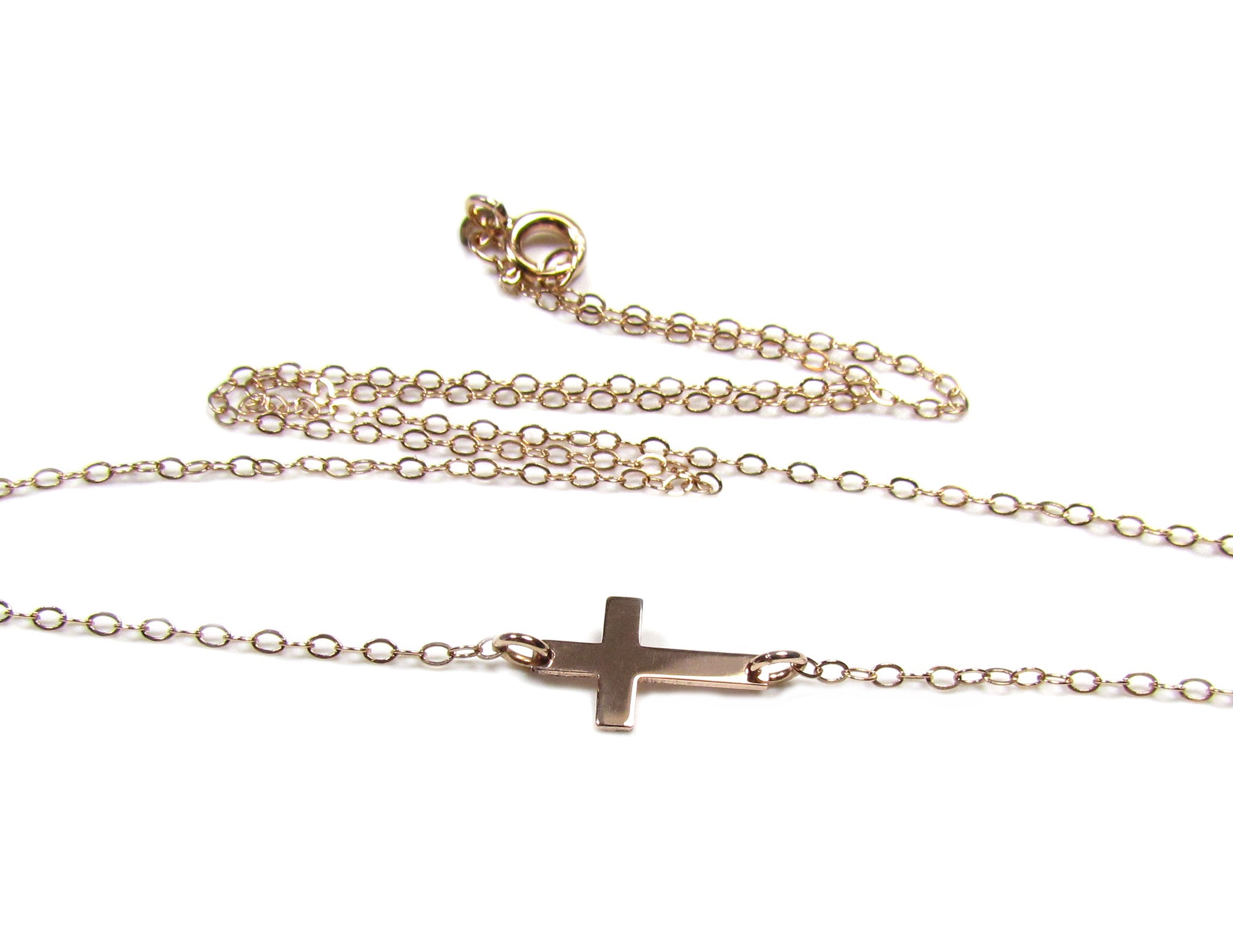 Mini sideways hot sale cross necklace